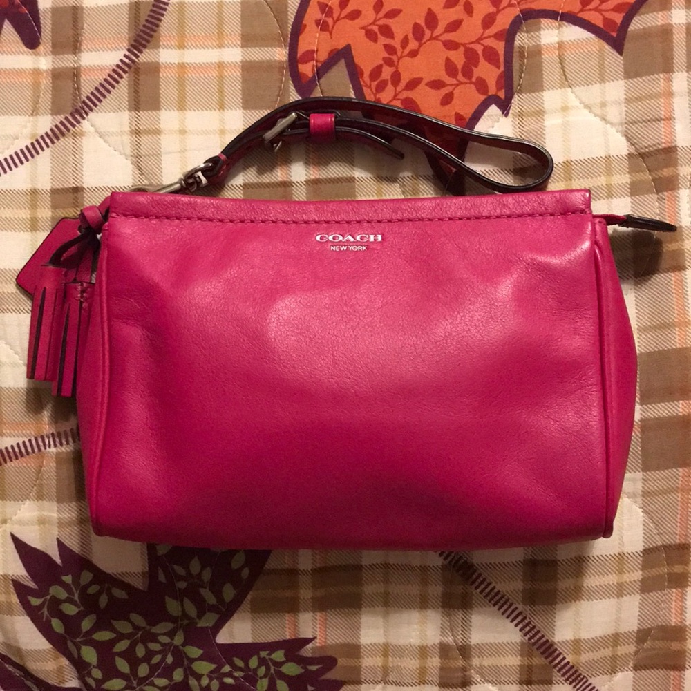 Pink leather COACH wristlet clutch
